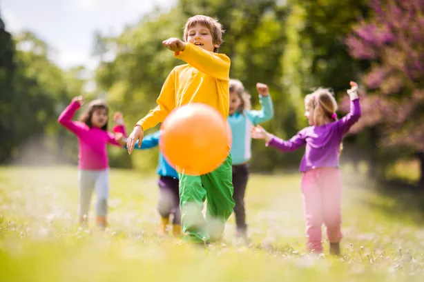 Social Development Activities for Preschoolers - Playing Catch with a Ball