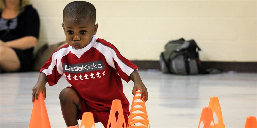 Balancing Activities for Toddlers - Cone Kick